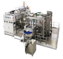 Extrusionsblasform- und Flaschenf&uuml;llmaschine 130 - 180 kN | UNIKA 2-510, UNIKA 2-700 TECHNE Technipack Engineering