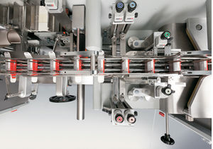 Toplader-Kartonierer / für die medizinische Industrie / kompakt / automatisch