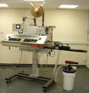 Sackverschließmaschine / Klebeband