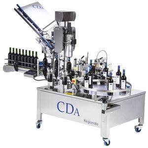 automatische Etikettiermaschine / für selbstklebende Etiketten / für Seitenauftrag / für Flaschen