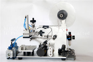 halbautomatische Etikettiermaschine / für Seitenauftrag / horizontal / für die Pharmaindustrie