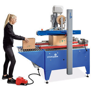 Faltschachtel-Verschließmaschine / mit Klebeband 1