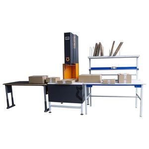 Verpackungsmaschine zur Reduzierung der Kartonhöhe