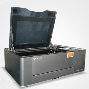 Schneide- und Graviermaschine / CO2-Laser