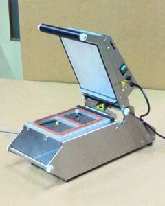 Verdeckelungsmaschine 1