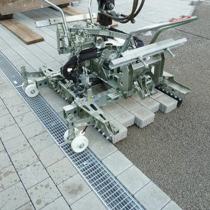 Hydraulische Zange / zur Pflasterverlegung