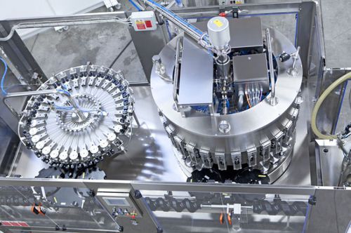 Automatische Füllmaschine - DELLA TOFFOLA GROUP - für Flaschen / für Alkoholgetränke / Schwerkraft