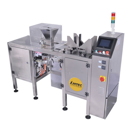 Horizontale Absackmaschine - up to 15 pcs./min. - AMTEC Packaging Machines - Vakuum / automatisch
