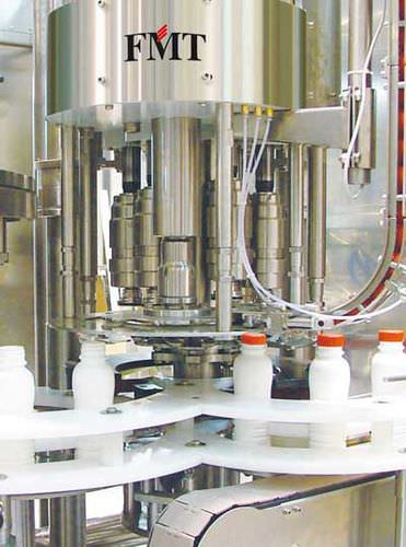 Abfüll- und Verschließanlage / Kolben - FMT - volumetrisch / Monoblock / Dreh