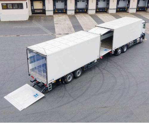 Sattelauflieger für Containertransport - M.KO - Schmitz Cargobull - Baumaschinentransporter / für lange Produkte / 4-Achsen