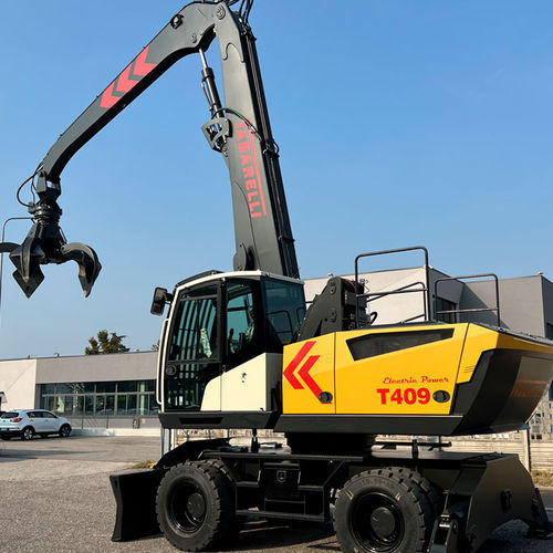 Umschlagbagger mit Gummireifen - T409-2CE - OFFICINA MECCANICA F.LLI TABARELLI SPA - elektrisch / Diesel