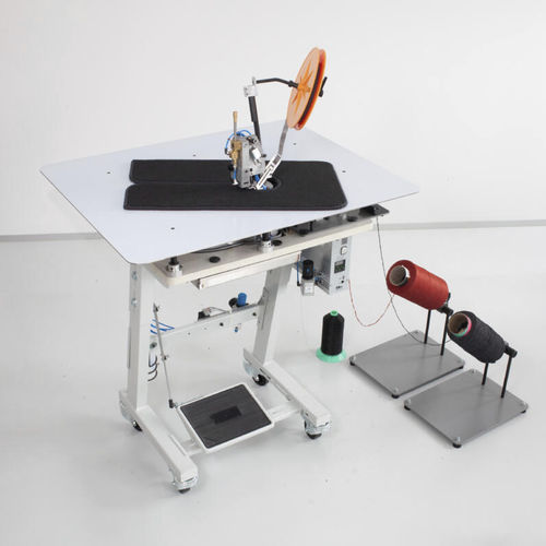 Overlockstich-Teppichkettelmaschine - TITAN 4500AHC - Vandewiele - Einzelnadel / 2-Faden / stationär