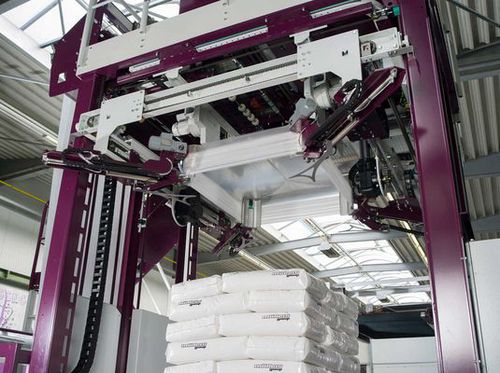 Automatische Haubenmaschine - HSA-Vario - Möllers - mit Stretchfolie / für Säcke / für Baustoffe