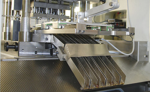 Umschlag-Handlingsystem - Feintool Technologie AG - für Pressen / für Teile