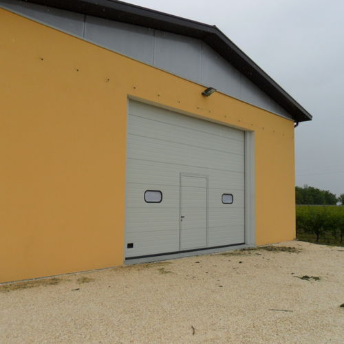 Sektionaltor - Tecnoindustriale s.r.l. - Metall / für Außenbereich / Hangar