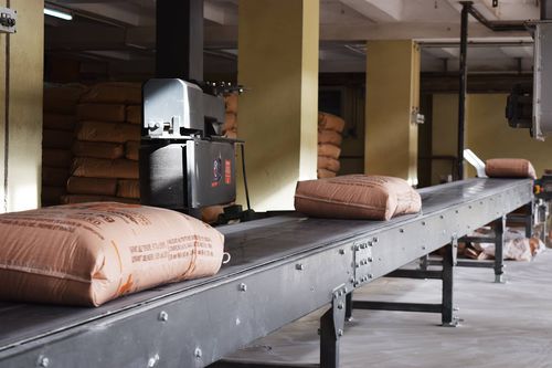 Förderer für Säcke - SAUTEC - Band / für Materialumschlag / Stapel