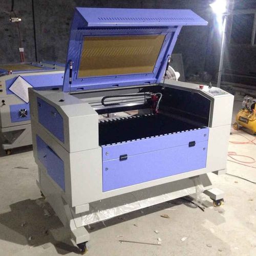 Gravier-Schneidemaschine - QFXF6090 - Shandong Wami CNC Technology Co., Ltd. - CO2-Laser / für Gummi / für Acryl