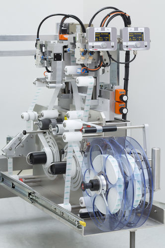 Etikettiermaschine/Siegelmaschine - Tamper Evident OEM - Weber Marking Systems