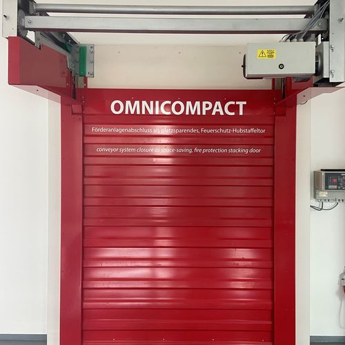 Rolltor - Omnicompact - STOBICH FRANCE - Metall / für Förderbänder / mit großen Abmessungen