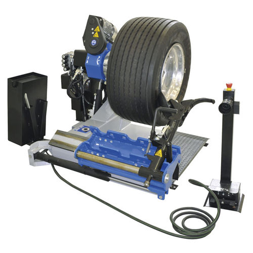 Reifenmontiermaschine für LKW - S 557 - GIULIANO INDUSTRIAL S.p.A. - automatisch / horizontal / elektrohydraulisch