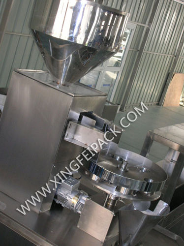 Granulatdosiergerät - Shanghai Xingfei Packaging Machinery Co., Ltd. - volumetrisch / automatisch / mit Drehteller
