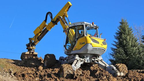 Mittelgroßer Bagger - M540 - Menzimuck - Rad / Diesel / Schreit