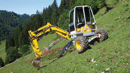 Mittelgroßer Bagger - A20 - Menzimuck - Rad / Diesel / Schreit