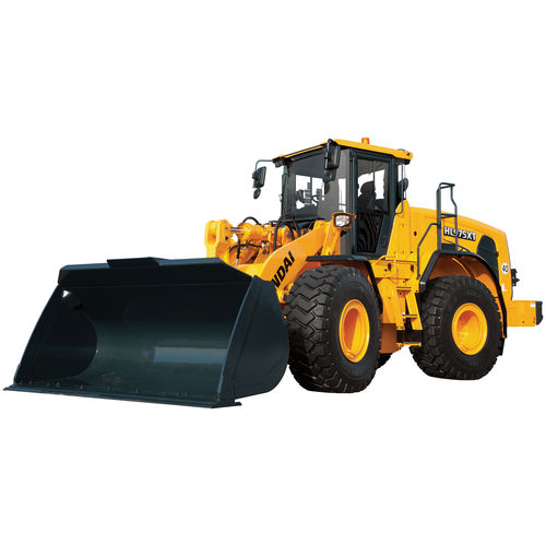 Radlader - HL975 XT - Hyundai Construction Equipment Americas, Inc. - mit Gelenk / für Baustelle