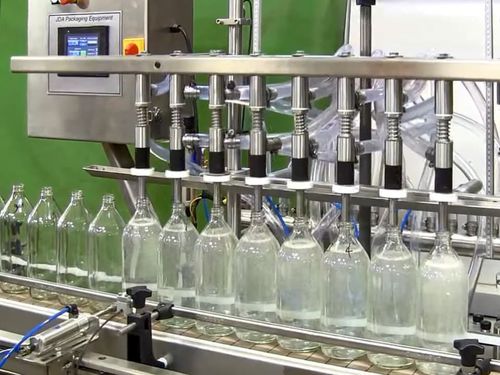 Vollautomatische Flaschenabfülllinie - JDA PROGRESS IND.