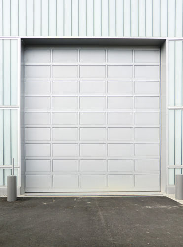 Sektional-Eingangstor - ACOUSTICLINE 29-35 DB - Jansen Tore GmbH & Co.KG - vertikal / Industrie / galvanisiertem Stahl