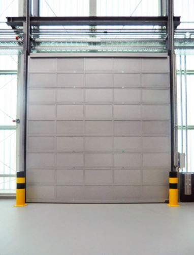 Schallschutz-Eingangstor - 39-42 DB - Jansen Tore GmbH & Co.KG - Sektional / vertikal / Industrie