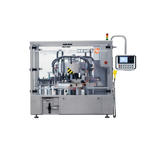 Automatische Etikettiermaschine - TORNADO R - HEUFT SYSTEMTECHNIK - für Flaschen / zur Rundumetikettierung / für die Getränkeindustrie