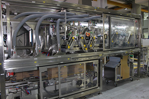 Kontinuierlicher Kartonpacker - Technica International - automatisch / für Säcke / für Verteilung