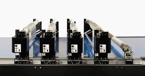 Auf- und Abwickelgerät / Gewebe - Eastman Machine Company - automatisch / Rollen