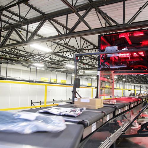 Sortierer mit Querteppich - CROSSORTER - VANDERLANDE - für die Logistik / optisch / für Prozess
