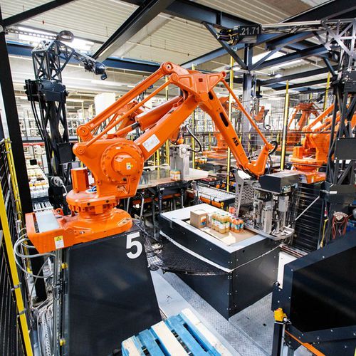 Roboter-Palettiersysteme - VANDERLANDE - Umschlag / für Kisten / automatisch