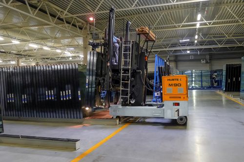 Elektrischer Seitenstapler - M 90 - HUBTEX - Sitz / für Materialumschlag / multidirektional