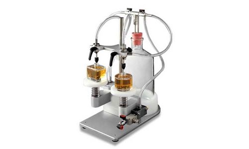 Halbautomatische Füllmaschine - VACUFILL - Omas Tecnosistemi S.p.a. - Multicontainer / für Flüssigkeiten / für Parfüm