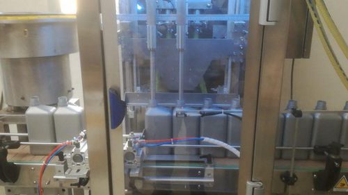 Abfüll- und Schraubverschlussanlage / für Öl - RT2U - PMR System Group - elektropneumatisch / für Plastik-Schraubdeckel / für Tanks