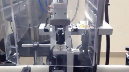 Automatische Füll Verschließ Etikettiermaschine - RTE1U - PMR System Group - Rotation / motorisiert / für Flüssigkeiten
