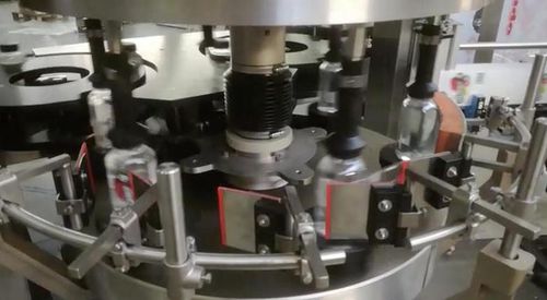Automatische Etikettiermaschine - MET6 - PMR System Group - für Flaschen / für die Lebensmittel- und Getränkeindustrie