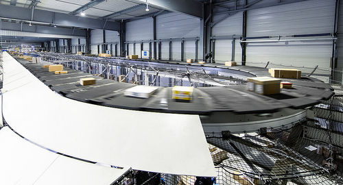 Sortieranlage mit Querteppich - GENI-BELT™ - Fives Cinetic SAS - automatisiert / Umschlag / Hochgeschwindigkeit