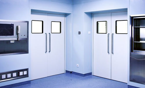 Einflügeltür - PUERTAS FERROFLEX SL - mit Scharnier / mehrteilig / Edelstahl