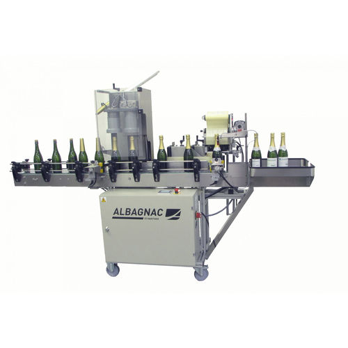 Etikettiermaschine mit Crimpsystem - CÉRÈS VIN EFFERVESCENT - Albagnac - automatisch / für Champagnerflaschen / zur Seitenetikettierung