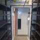 Schiebetür / Edelstahl / galvanisiertem Stahl / PVC