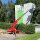 gezogene Teleskoparbeitsbühne / auf Rädern / mit Verbrennungsmotor / für Außenbereich