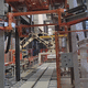 automatische Haubenmaschine / mit Stretchfolie / Paletten / vertikal