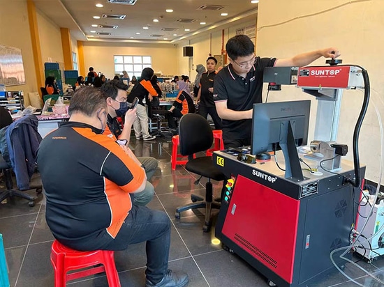 Suntop liefert 3D-UV-Laserbeschriftungsmaschine nach Malaysia zur Produktverbesserung