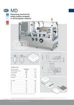 MD depacking machine for bottles wrapped in shrink-plastic material